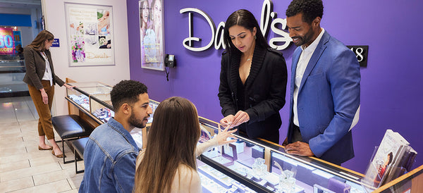 Couple looking at Jewelery in showroom