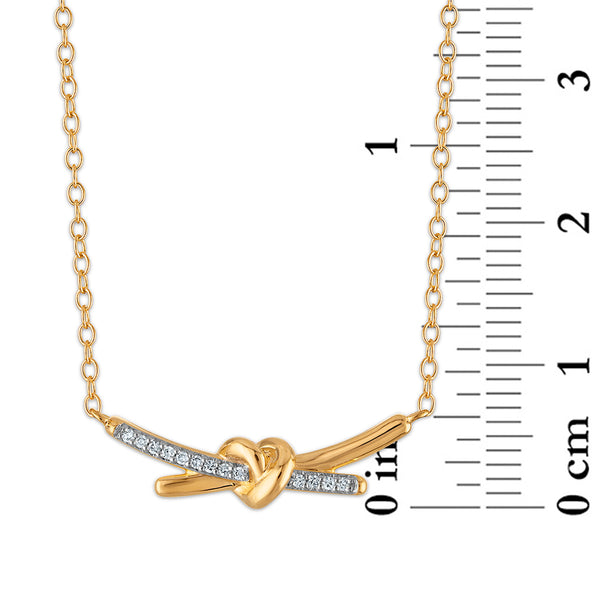 Diamond Accent Love Knot Necklace in Gold Plated Sterling Silver