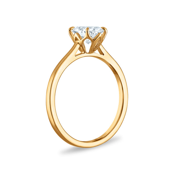 White Diamond Solitaire Ring in 10KT Gold