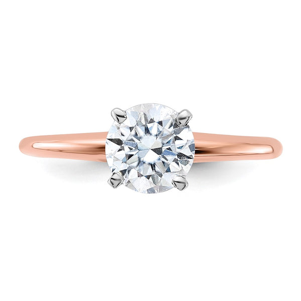 6.5MM Round Moissanite Solitaire Engagement Ring in 14KT Rose Gold. Size 7