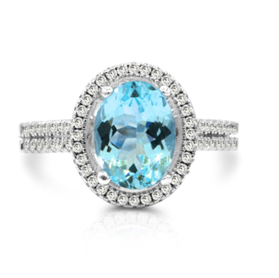 9X7MM Oval Blue Topaz and White Topaz Halo Ring in Sterling Silver